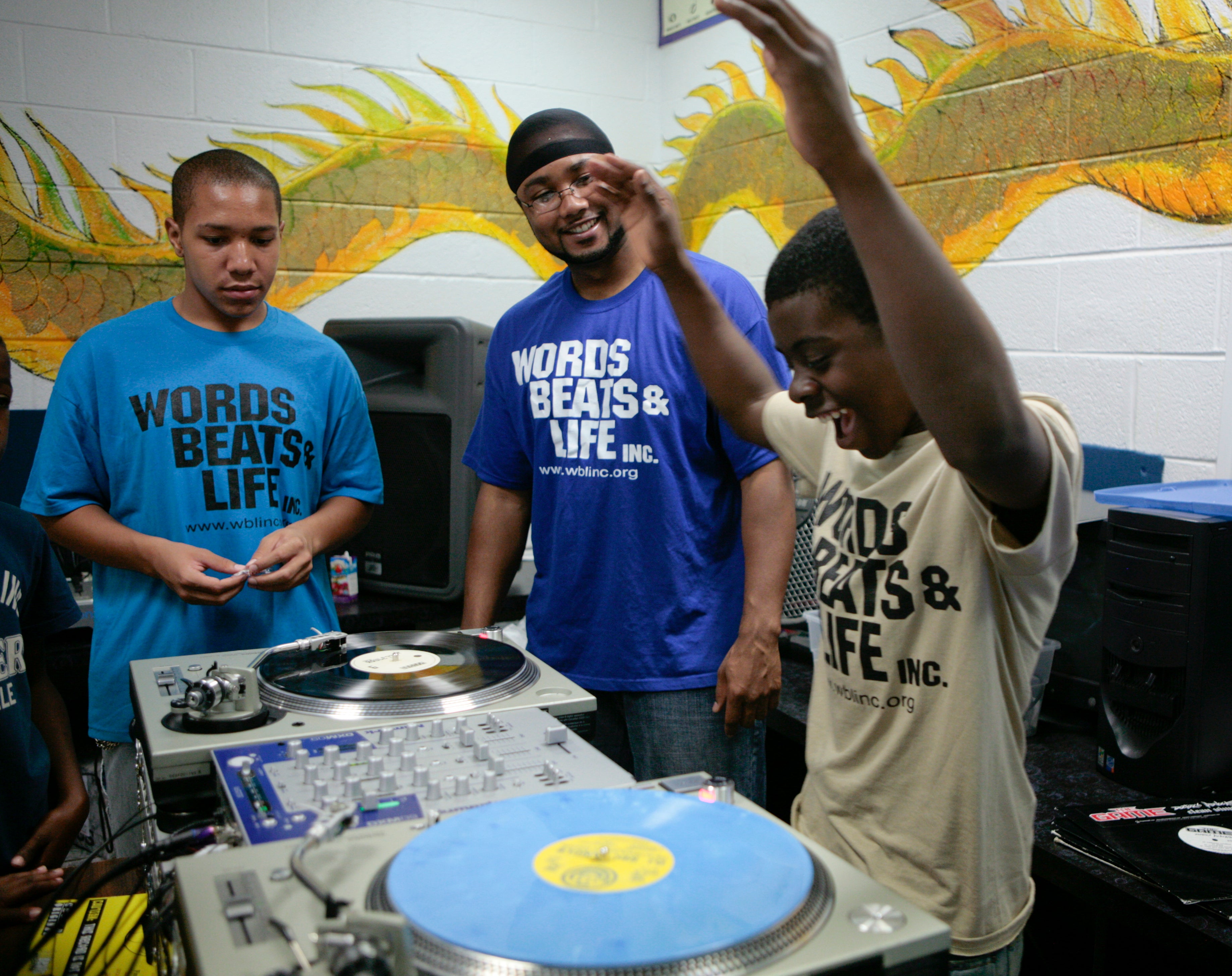Youth experiment with DJing afters chool.