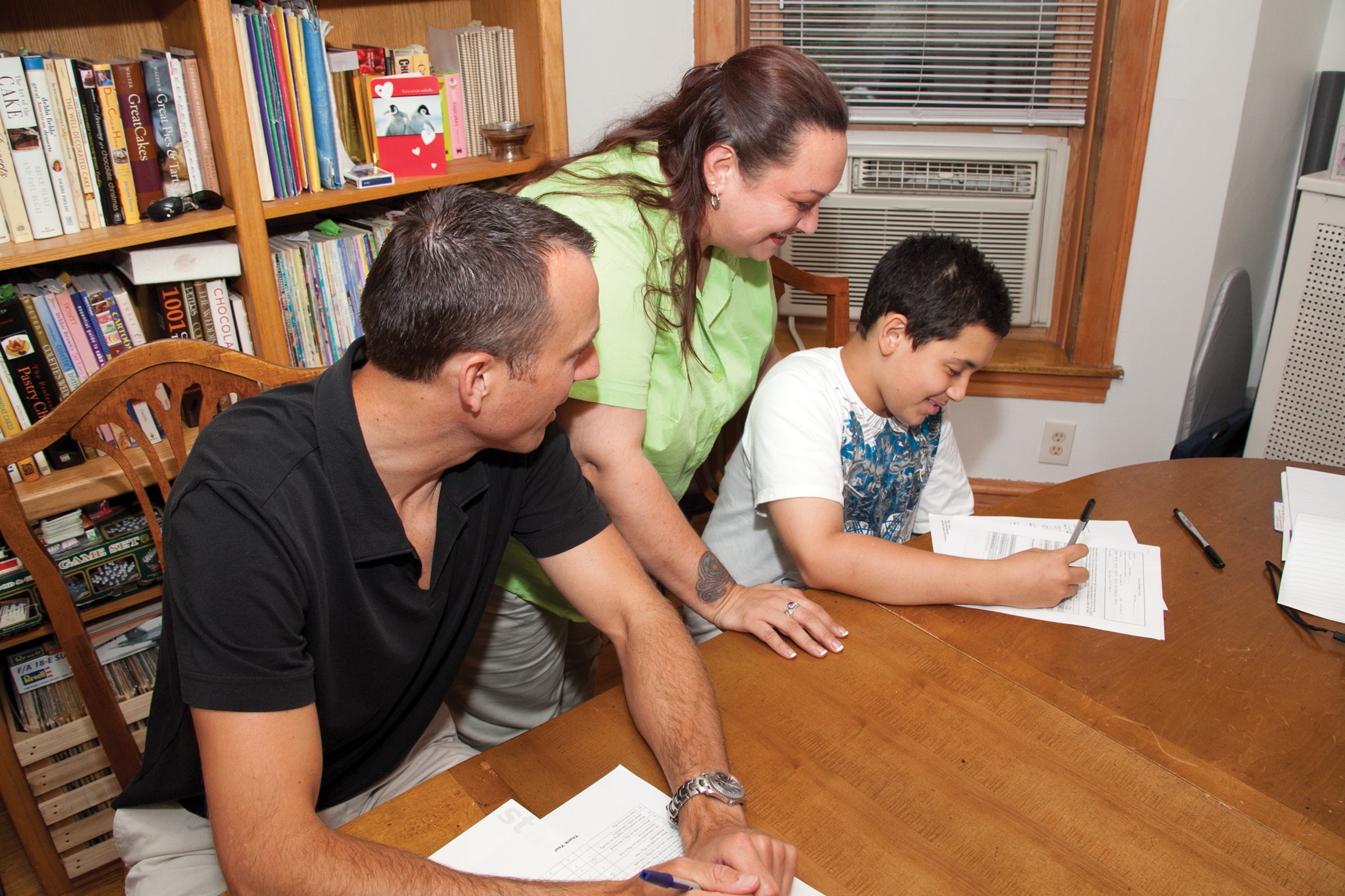 Michael Loehrke, a Big Brother, with his “Little,” Chris Garcia, and Chris’ mother, Robyn Garcia