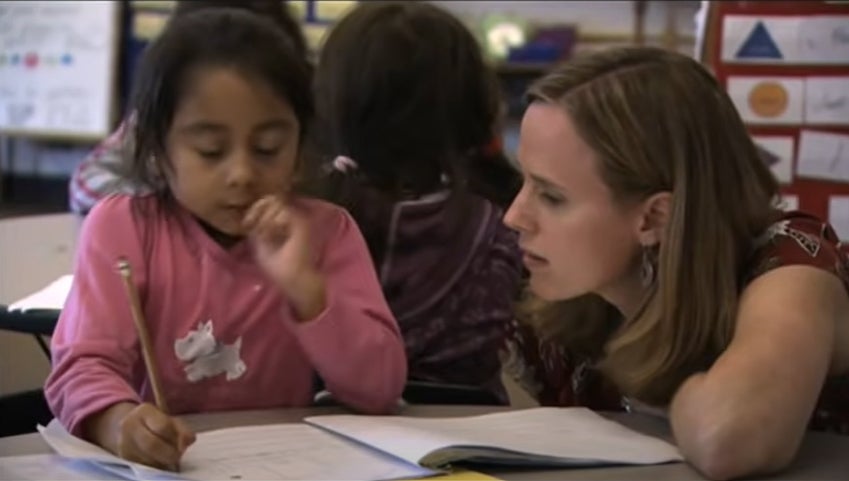 A principals helps a student in Oregon