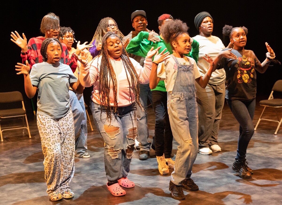 Group of children dancing on stage