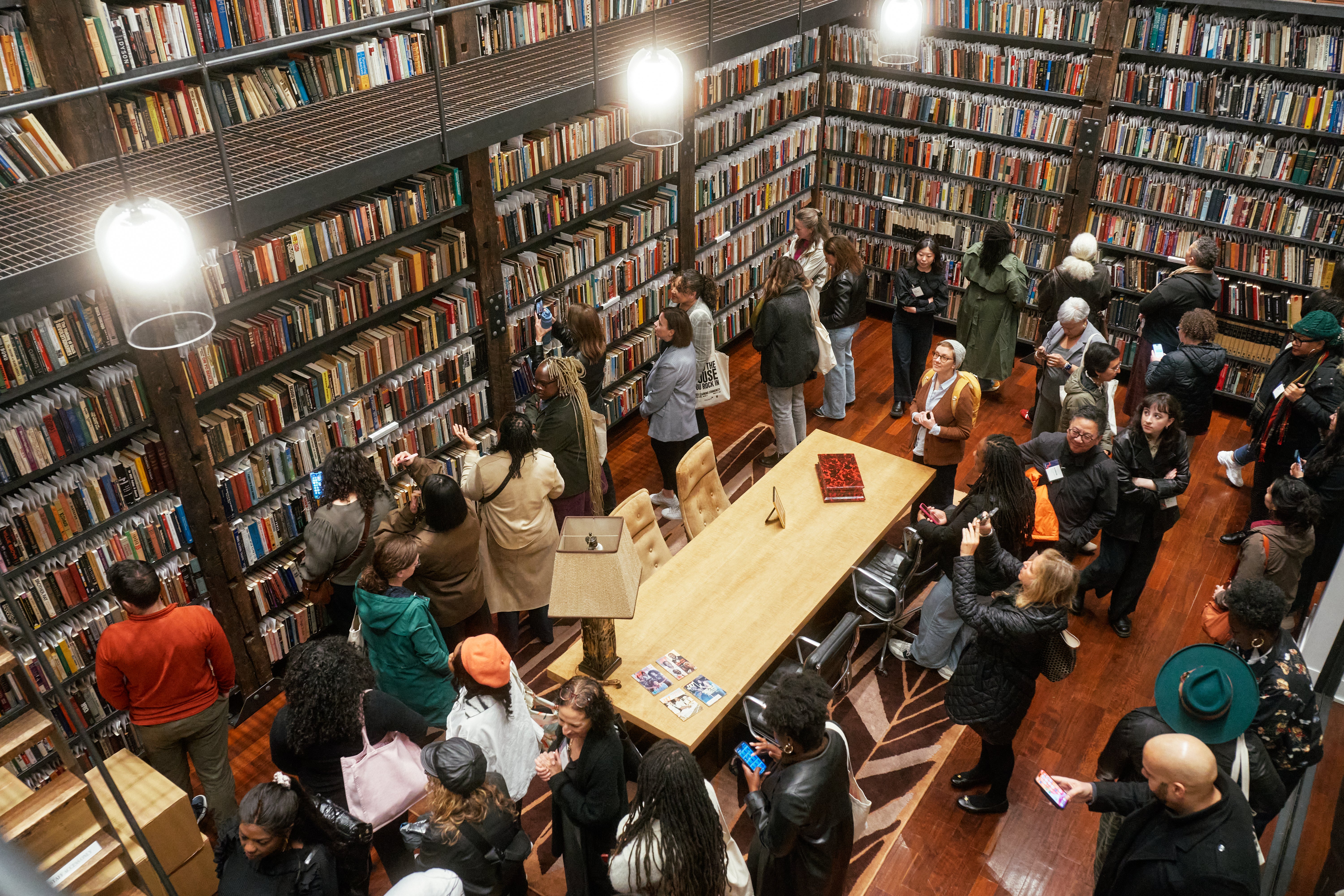 Group of people in a library collection.