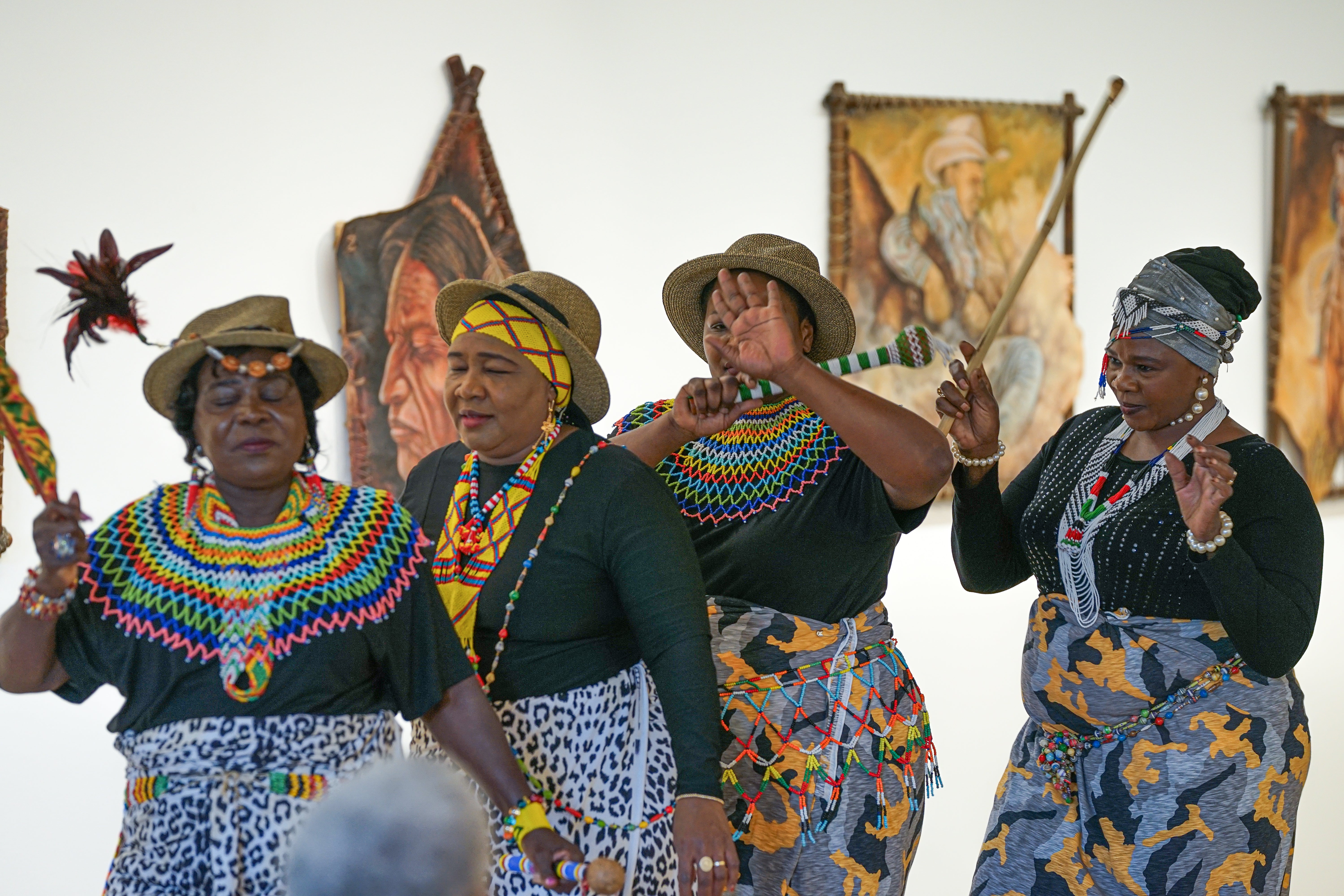 Image of women dancing in a line